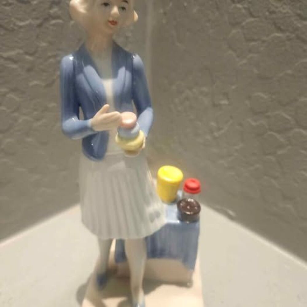 Porcelain Tupperware Lady Figurine 8"